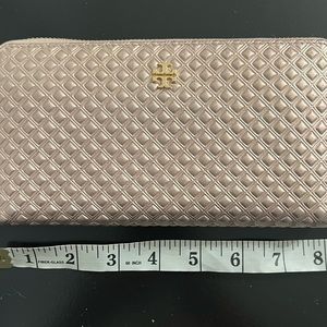 Tory Burch
Rose Gold Marion Metallic Embossed Zip Around Wallet
7"L x 1"W x 4"H